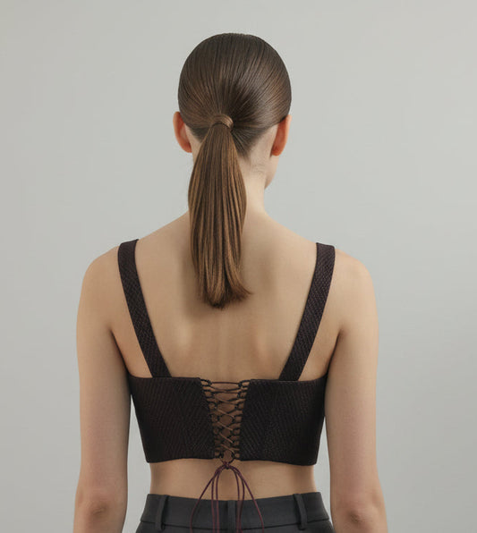 corset with strap.